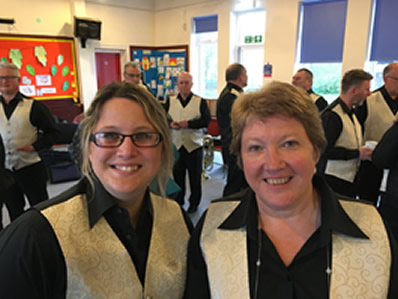 Leah and Cathryn from Tiverton Band helping out